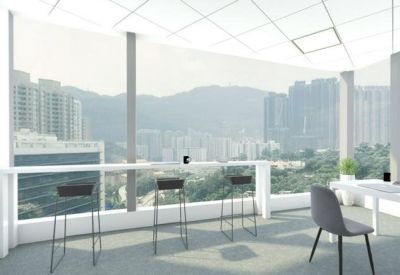 Modern breakfast bar with stools facing floor-to-ceiling windows with mountain views.