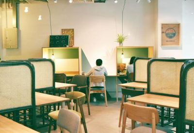 Private study carrels with integrated lighting and ergonomic chairs for focused work.