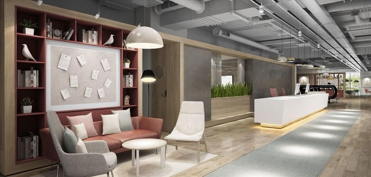 Spacious reception area of Lee Gardens 3 featuring a white front desk and comfortable lounge seating.