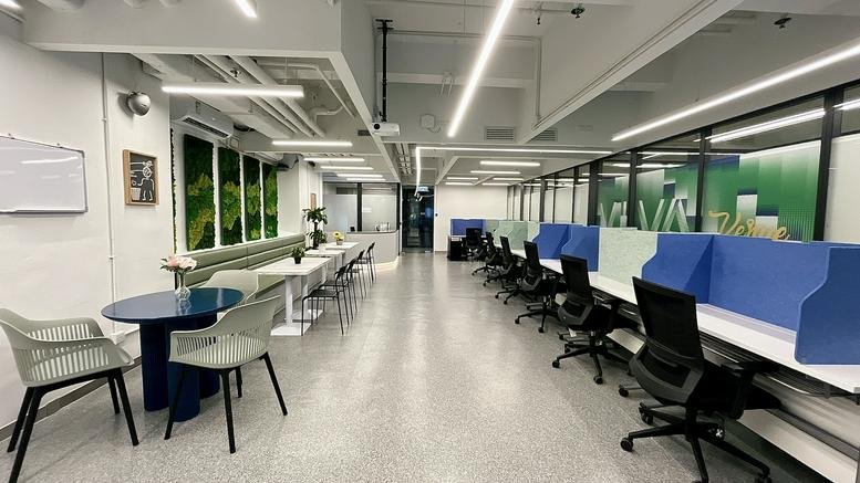 Spacious communal lounge with diverse seating options and modern lighting.