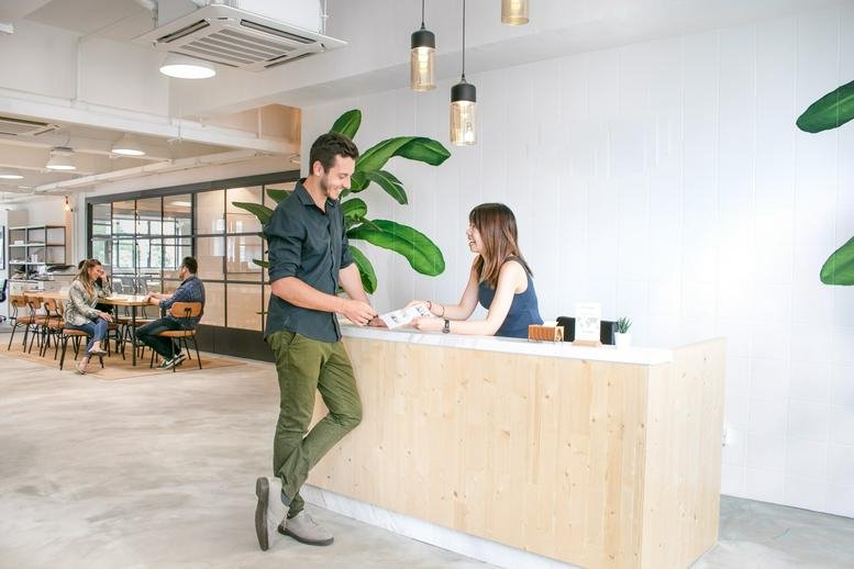 Bright wooden reception area at Cheung Hing Industrial Building, 12P Smithfield Road, Level 7, Hong Kong.