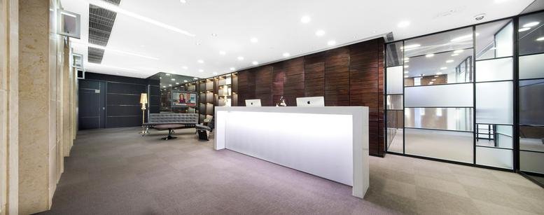 Sleek, modern reception area at Millennium City 3, 370 Kwun Tong Road.