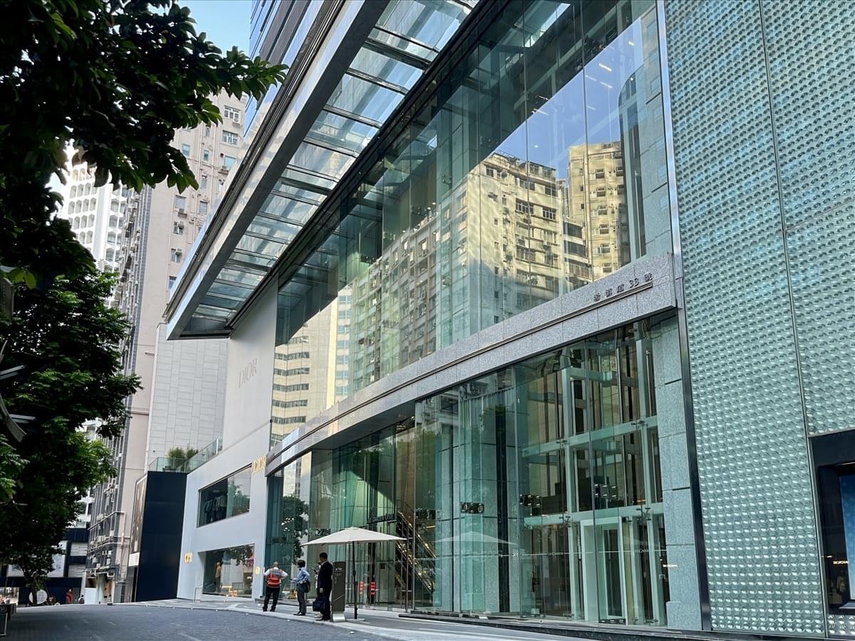 Exterior glass facade and modern entrance of Lee Garden One.