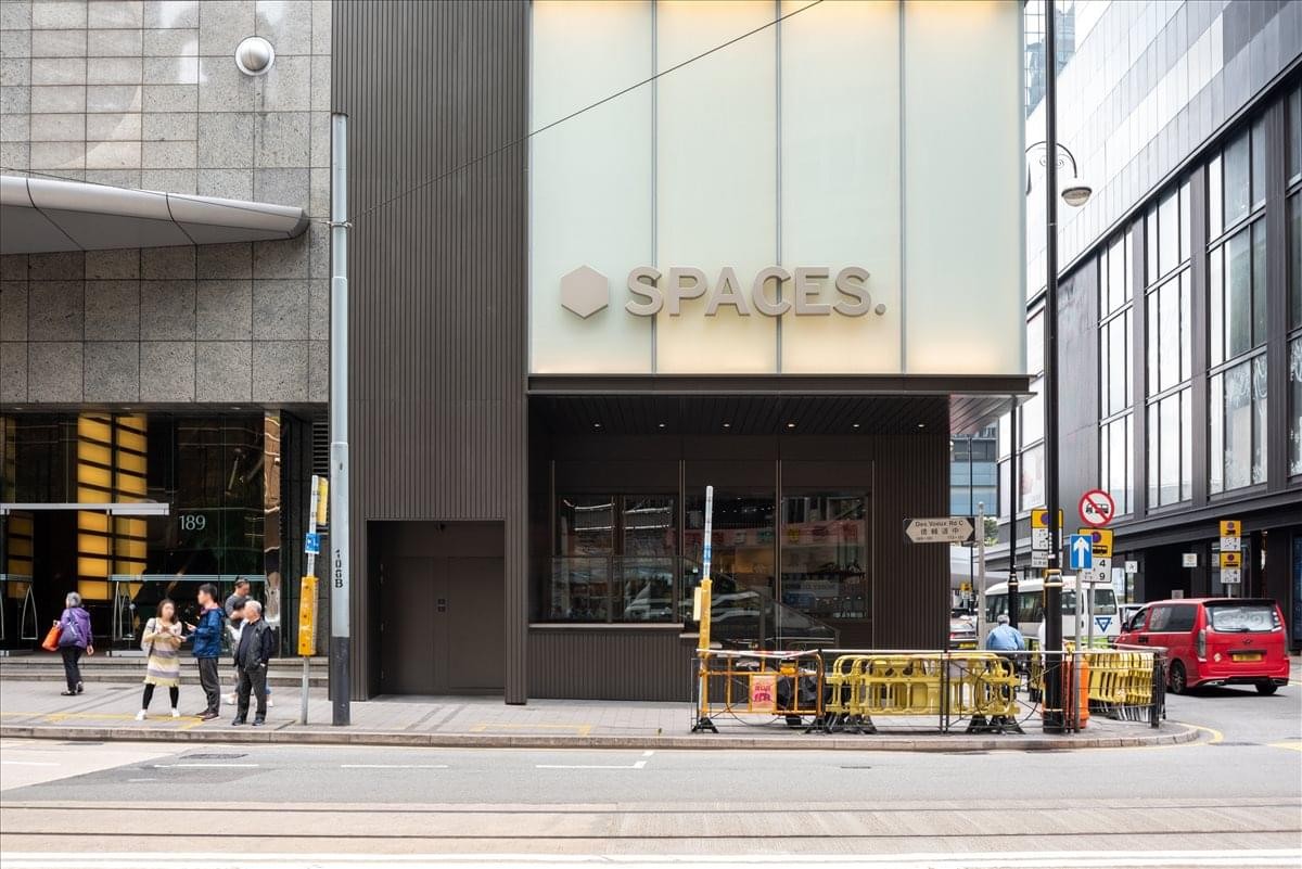Exterior street-level view of the modern facade at Sun House, 181 Des Voeux Road Central.