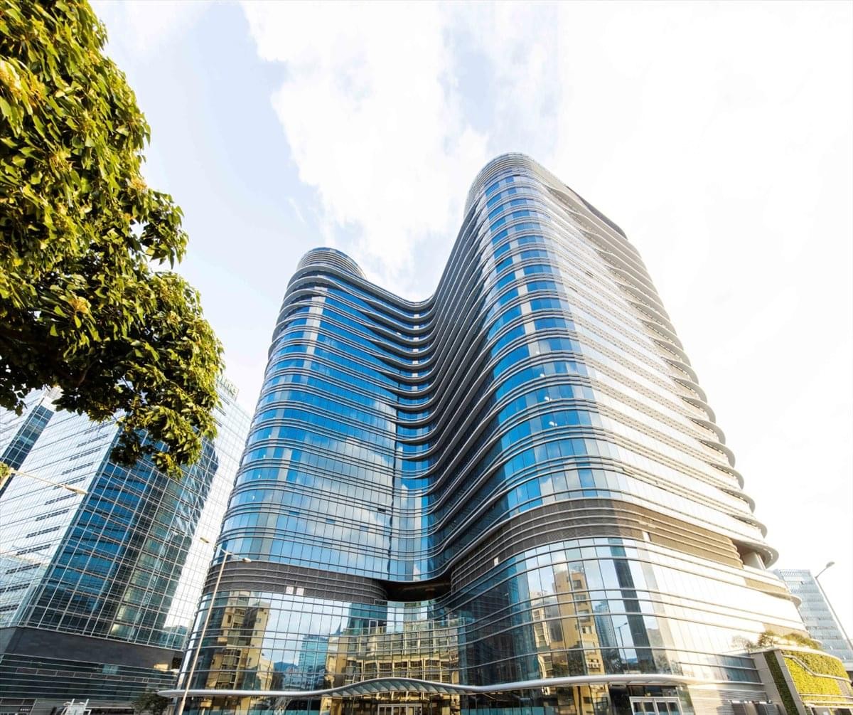 Exterior view of the glass-facade The Quayside Tower 1 in Kwun Tong.