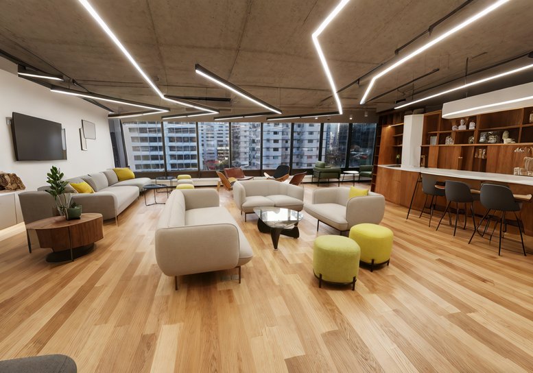 Modern lounge area featuring light-colored sofas, yellow stools, and stylish geometric lighting.