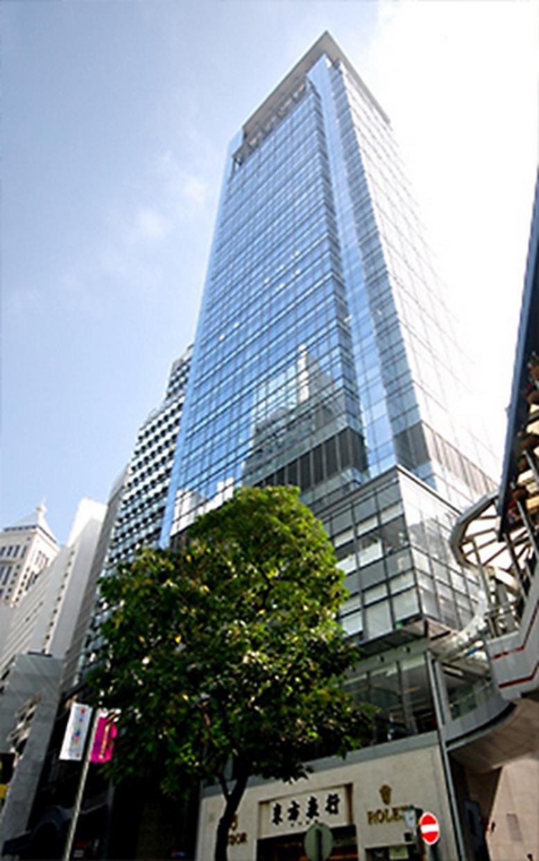 Exterior view of the modern glass facade of Prosperity Tower.