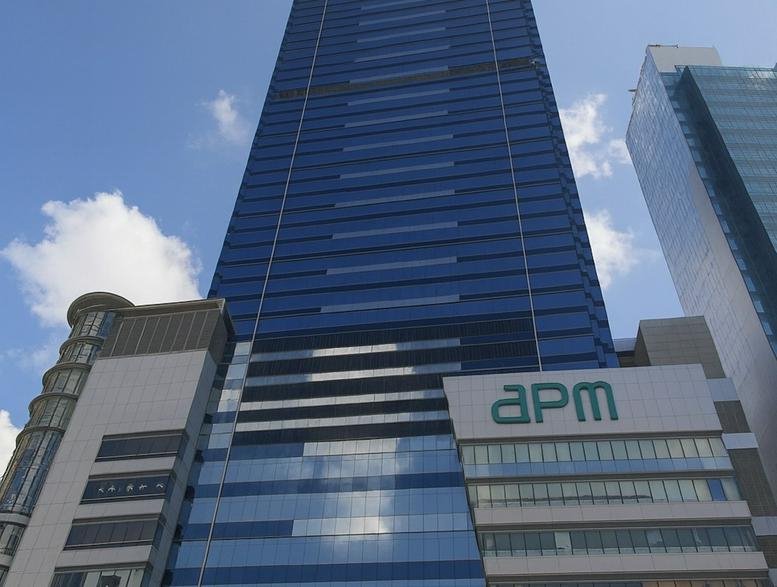 Exterior view of the blue glass skyscraper known as BEA Tower at Millennium City 5.