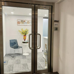 Glass entrance doors to a professional office suite, Lippo Sun Plaza, Tsim Sha Tsui, Hong Kong.