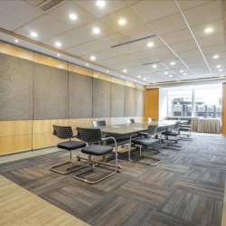 Spacious professional conference room with a long table and wood-panelled walls, Wanchai, Hong Kong